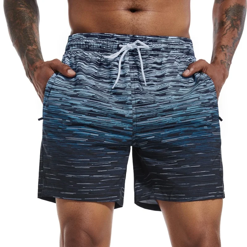 กางเกงว่ายน้ำลายทางไล่เฉดสีทัน - Trunks Board Surf บทวิจารณ์และราคา
